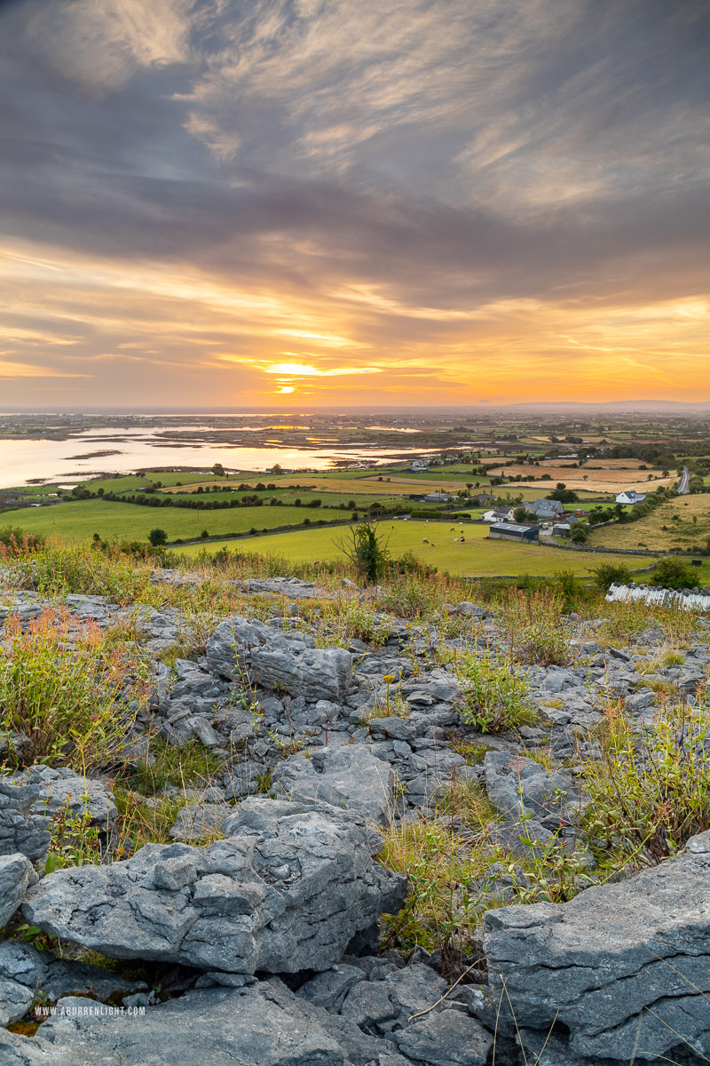 Abbey Hill Burren Clare Ireland - abbey hill,august,golden,hills,long exposure,orange,summer,sunrise,valerian