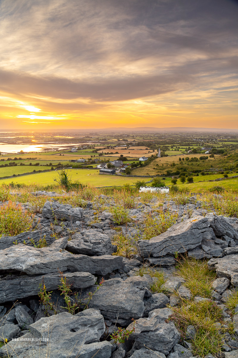 Abbey Hill Burren Clare Ireland - abbey hill,august,golden,hills,long exposure,orange,summer,sunrise,valerian