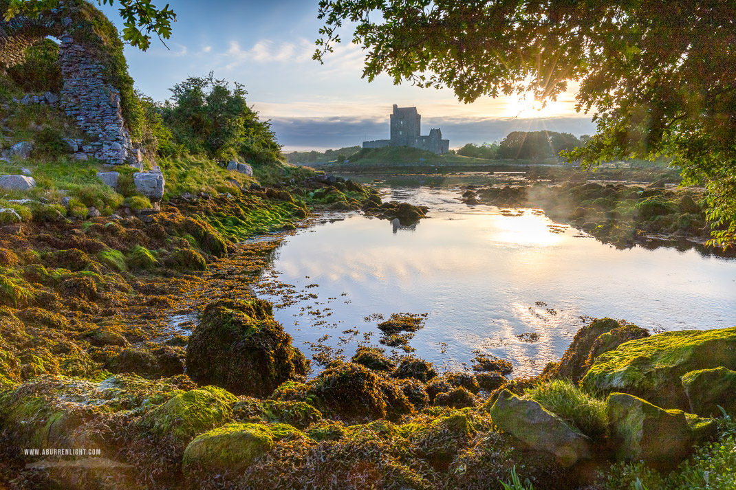 Dunguaire Castle Kinvara Clare Ireland - castle,dunguaire,july,landmark,myst,reflections,summer,sunrise,sunstar,coast