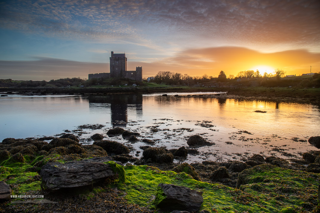 Dunguaire Castle Kinvara Clare Ireland - castle,dunguaire,green algae,kinvara,landmark,march,orange,sunrise,winter,coast,