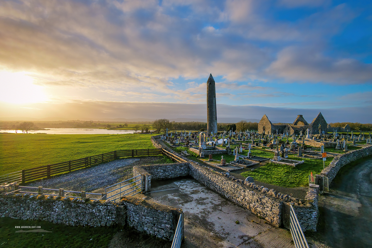 Kilmacduagh Monastery Burren Clare Ireland - cemetary,church,drone,february,golden,kilmacduagh,landmark,sunset,tower,winter,lowlands