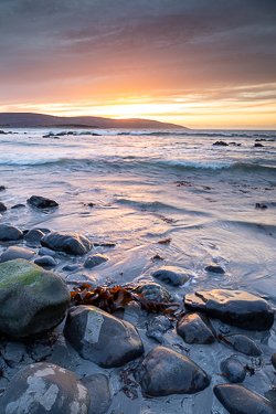 boulder,dusk,flaggy shore,golden,march,orange,sunset,winter,coast