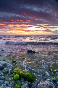 afterburn,boulders,coast,dusk,flaggy shore,july,pebbles,summer,sunset