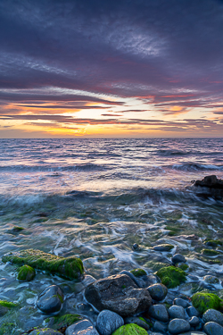 afterburn,boulders,coast,dusk,flaggy shore,july,pebbles,summer,sunset